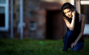 Girl sitting outside in grass grass girl 1 800x1280